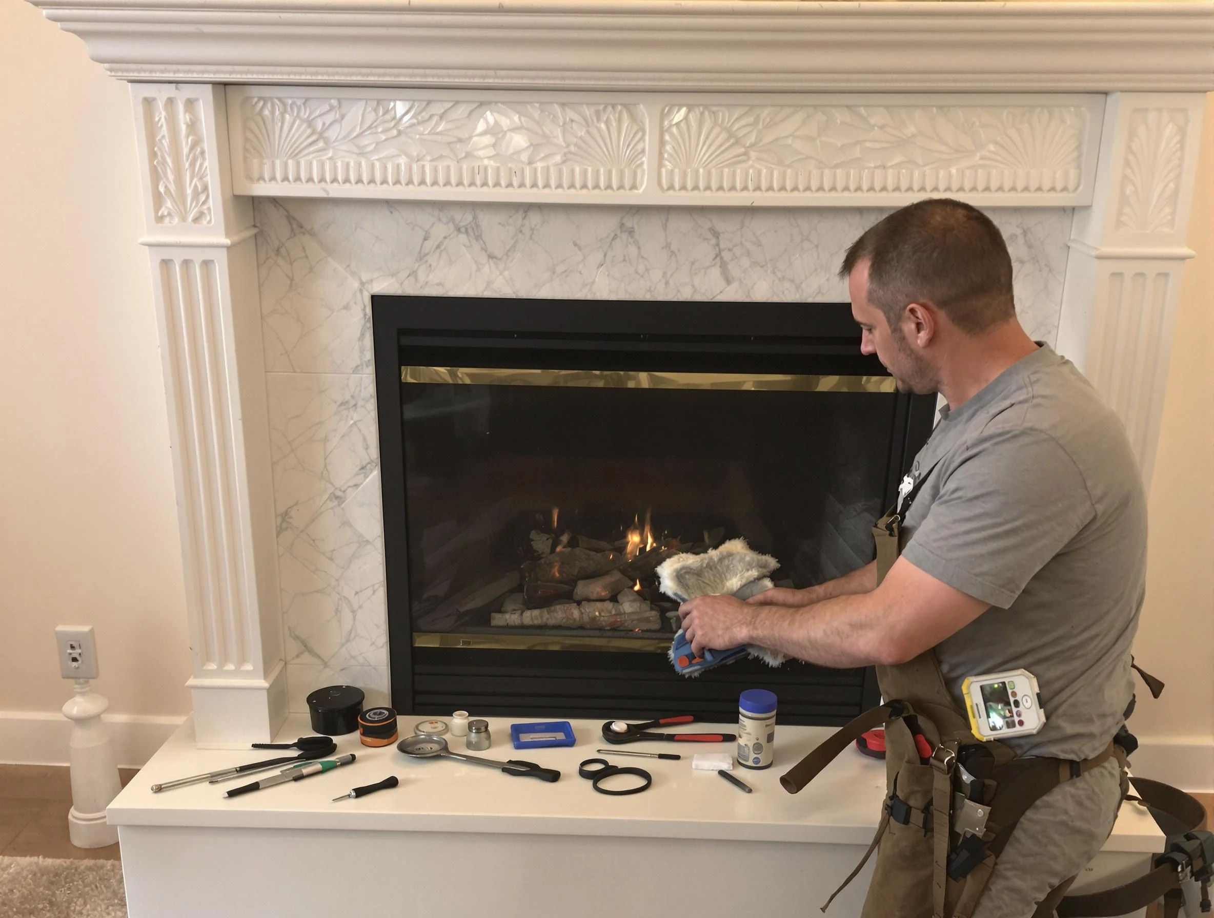 Franklin Chimney Sweep performing fireplace maintenance in Franklin, MA
